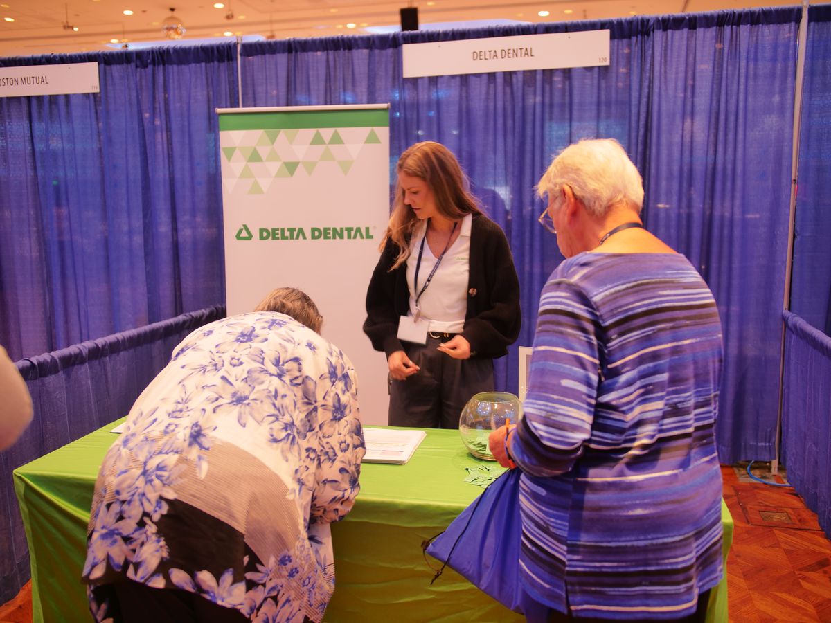 Members engaged on the convention floor